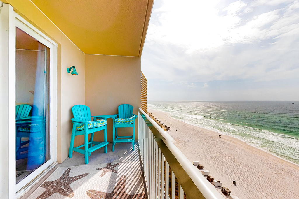 Colorful, waterfront condo with pools, gym, & beach access