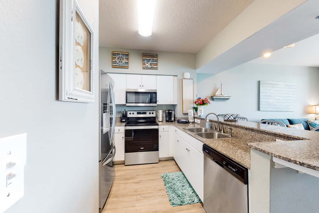 Updated beachfront condo with pool, hot tub, WD, & central AC