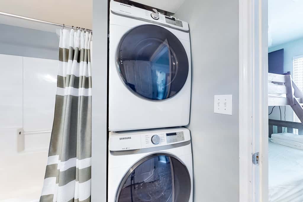 Updated beachfront condo with pool, hot tub, WD, & central AC