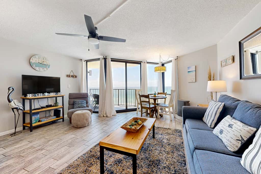 Gulf-view condo with pools, beach access, gym, grills, & updated interior