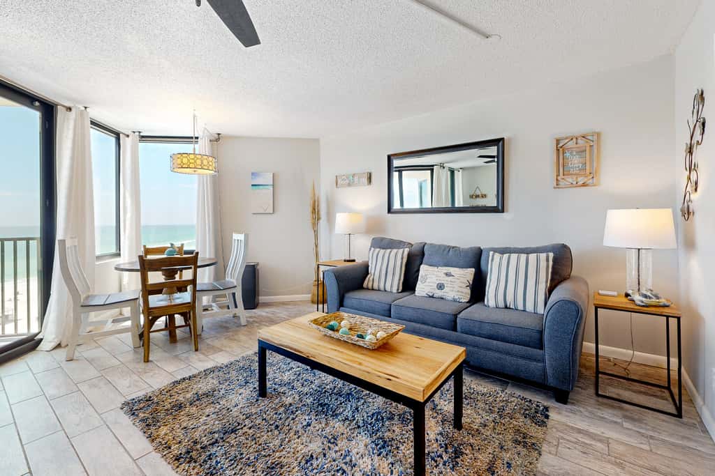 Gulf-view condo with pools, beach access, gym, grills, & updated interior