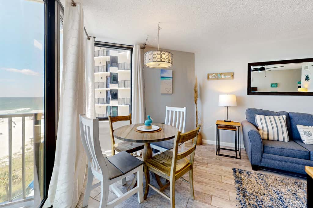 Gulf-view condo with pools, beach access, gym, grills, & updated interior