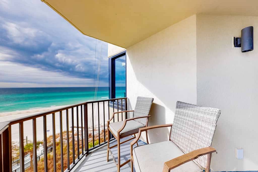 Beachfront condo with a private balcony, three pools, tennis, & picnic area