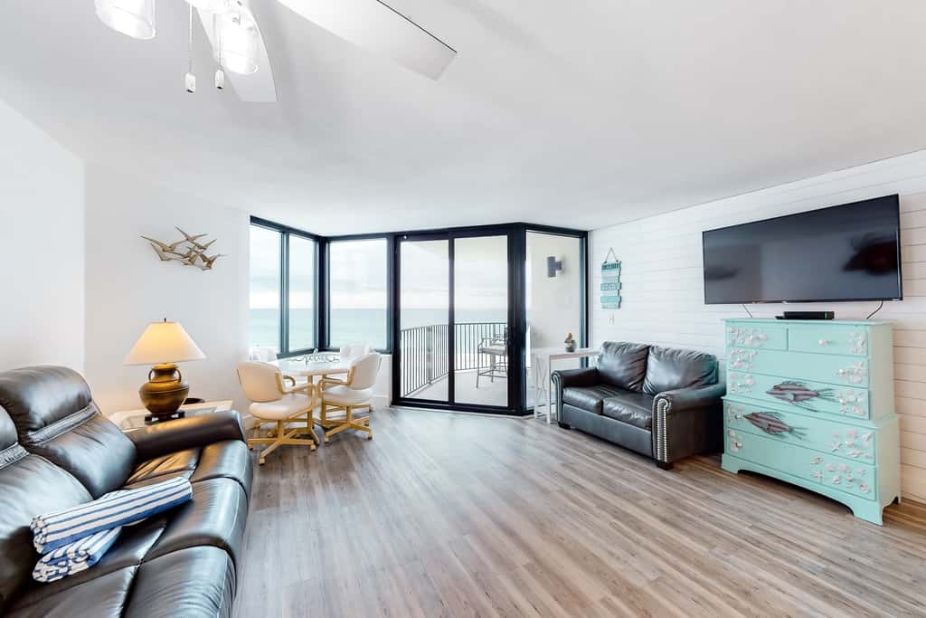 Beachfront condo with a private balcony, three pools, tennis, & picnic area
