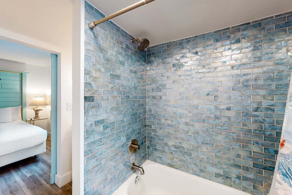 Beachfront condo with a private balcony, three pools, tennis, & picnic area