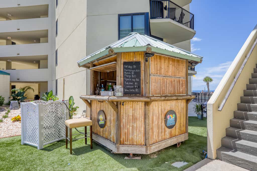 Beachfront condo with a private balcony, three pools, tennis, & picnic area