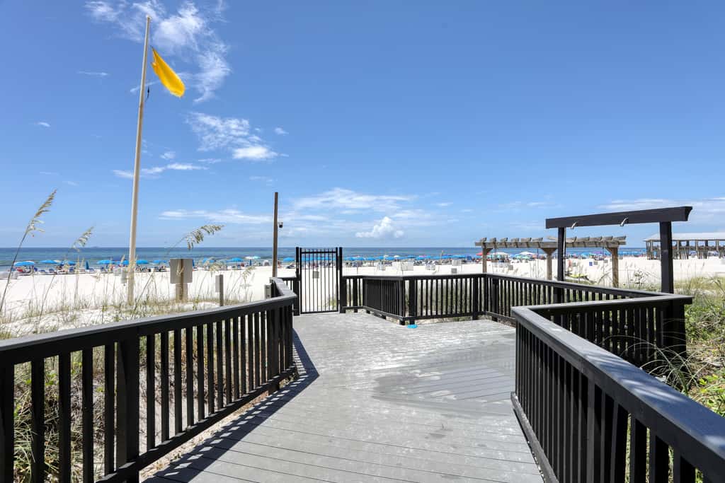 Beachfront condo with a private balcony, three pools, tennis, & picnic area