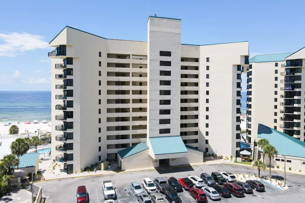 Beachfront condo with a private balcony, three pools, tennis, & picnic area