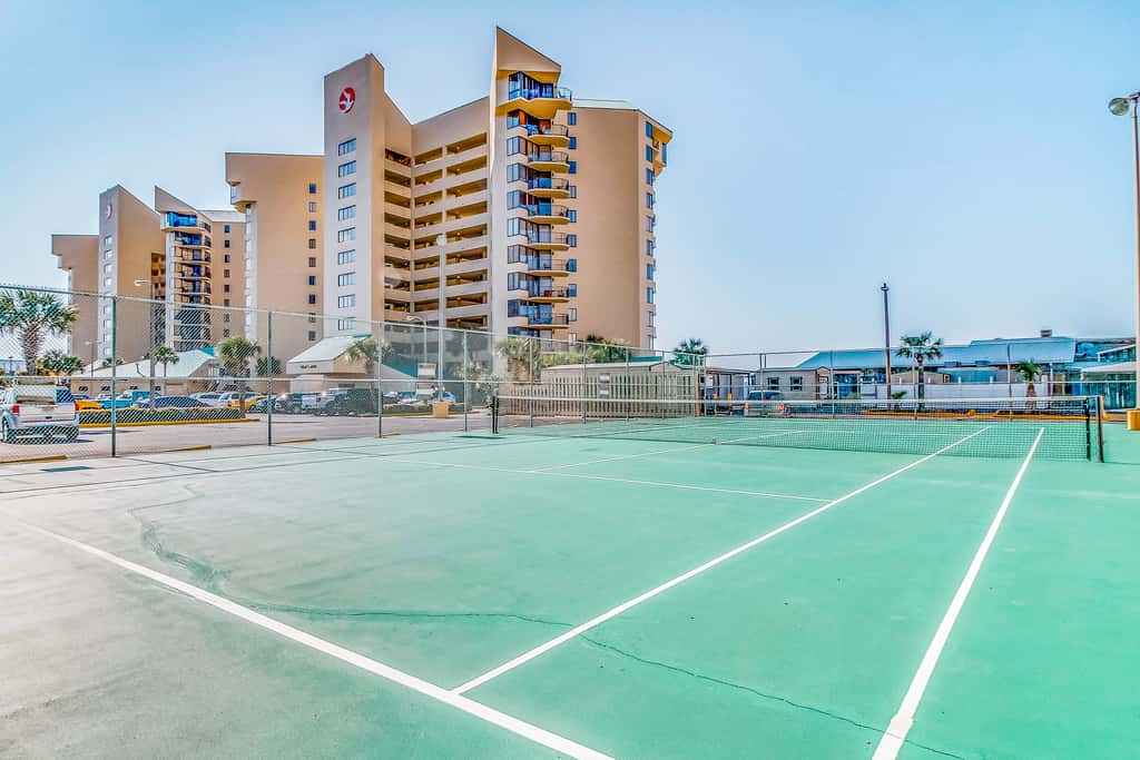 Beautiful beachfront getaway with balcony, pools, tennis, and WiFi