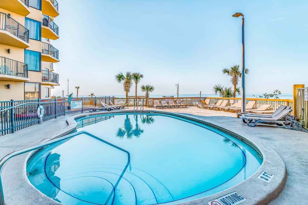 Beautiful beachfront getaway with balcony, pools, tennis, and WiFi