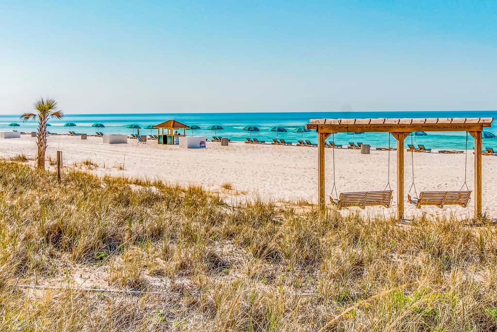 Beautiful beachfront getaway with balcony, pools, tennis, and WiFi