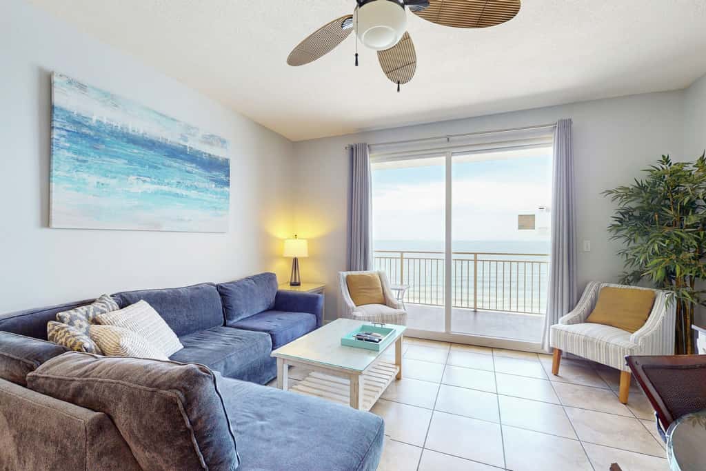 Tropical-themed condo with bi-level pool, fitness center & beach access