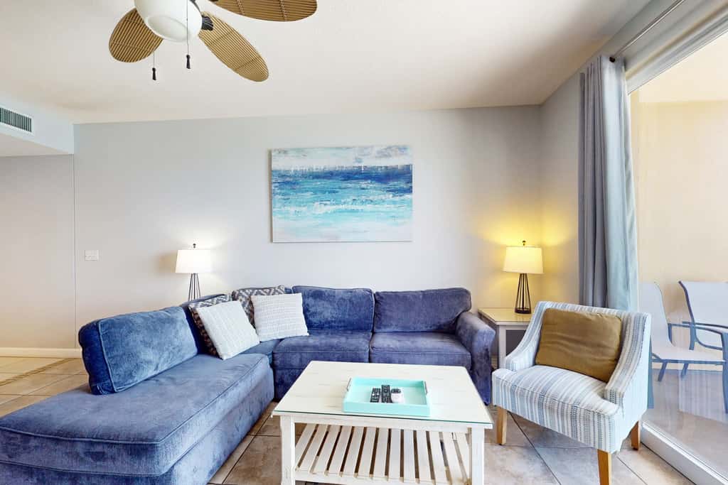 Tropical-themed condo with bi-level pool, fitness center & beach access