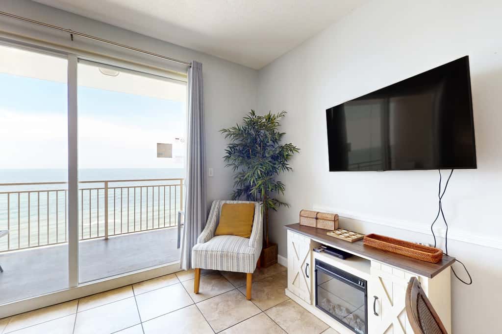 Tropical-themed condo with bi-level pool, fitness center & beach access