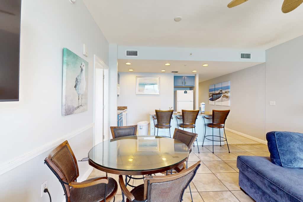 Tropical-themed condo with bi-level pool, fitness center & beach access