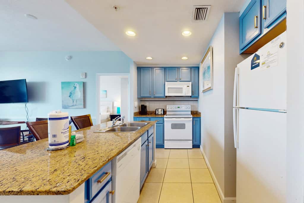 Tropical-themed condo with bi-level pool, fitness center & beach access