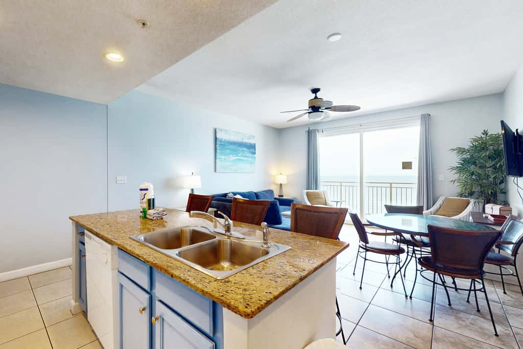 Tropical-themed condo with bi-level pool, fitness center & beach access