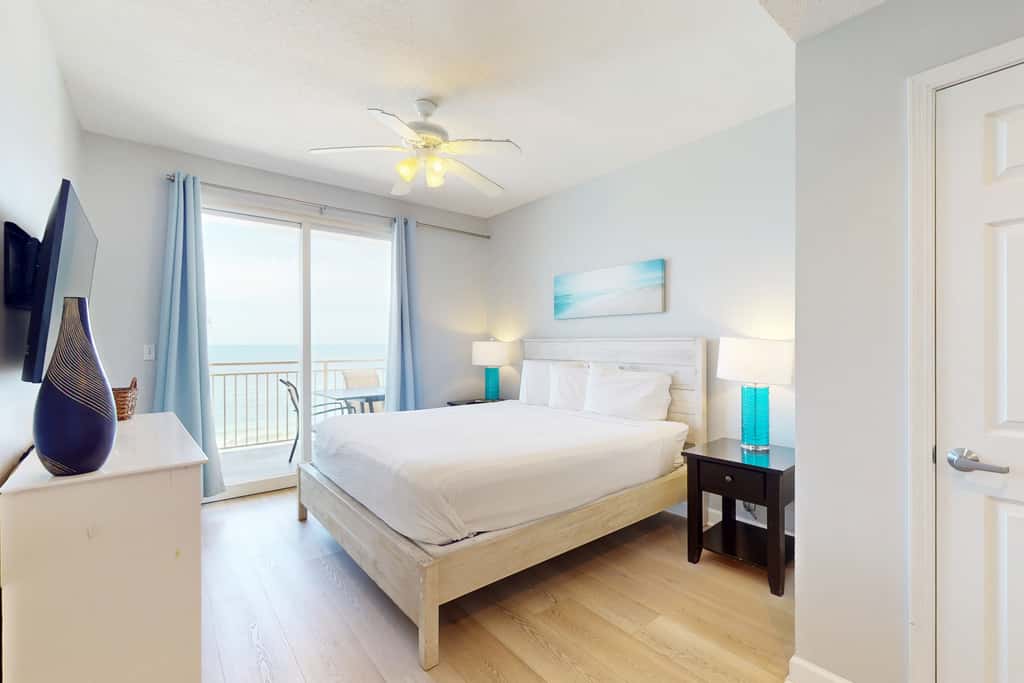 Tropical-themed condo with bi-level pool, fitness center & beach access