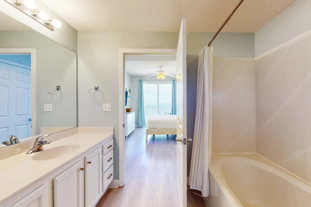 Tropical-themed condo with bi-level pool, fitness center & beach access