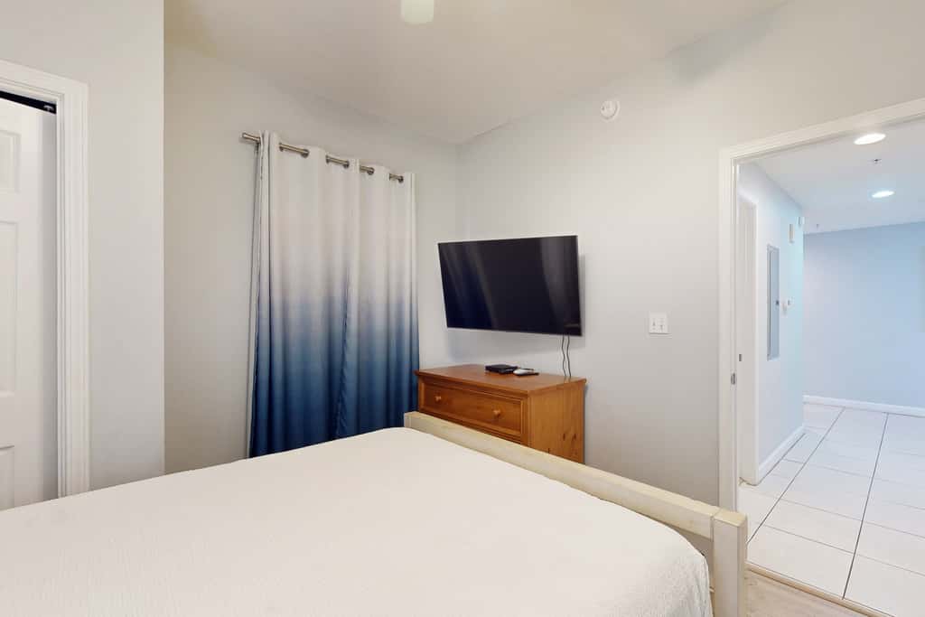 Tropical-themed condo with bi-level pool, fitness center & beach access