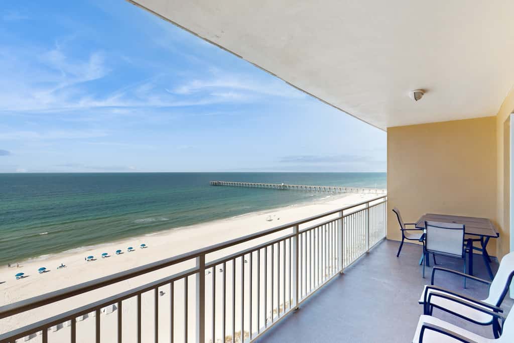 Tropical-themed condo with bi-level pool, fitness center & beach access