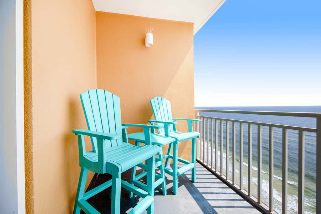 Colorful, beachfront condo with Gulf view, pool, hot tub, and lazy river