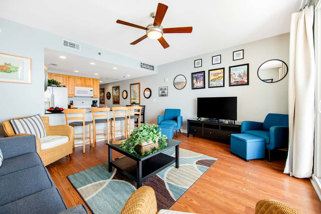 Colorful, beachfront condo with Gulf view, pool, hot tub, and lazy river