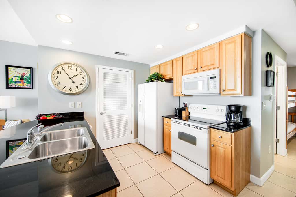 Colorful, beachfront condo with Gulf view, pool, hot tub, and lazy river