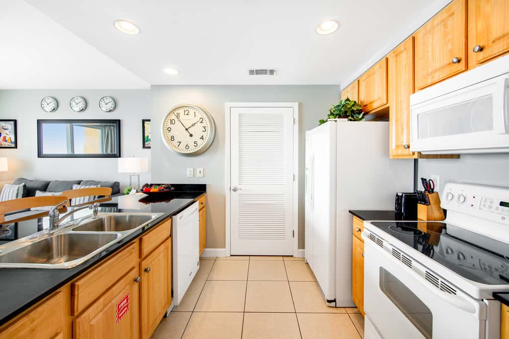 Colorful, beachfront condo with Gulf view, pool, hot tub, and lazy river
