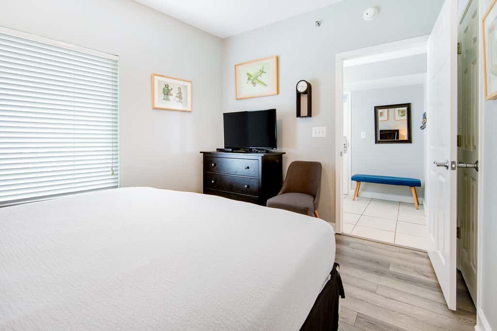 Colorful, beachfront condo with Gulf view, pool, hot tub, and lazy river