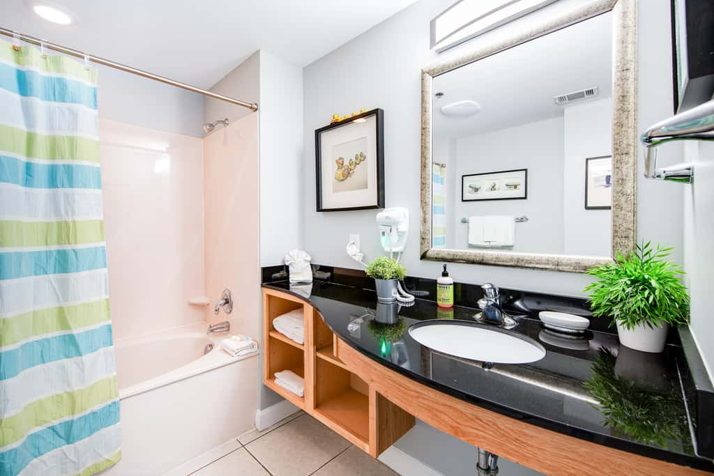 Colorful, beachfront condo with Gulf view, pool, hot tub, and lazy river