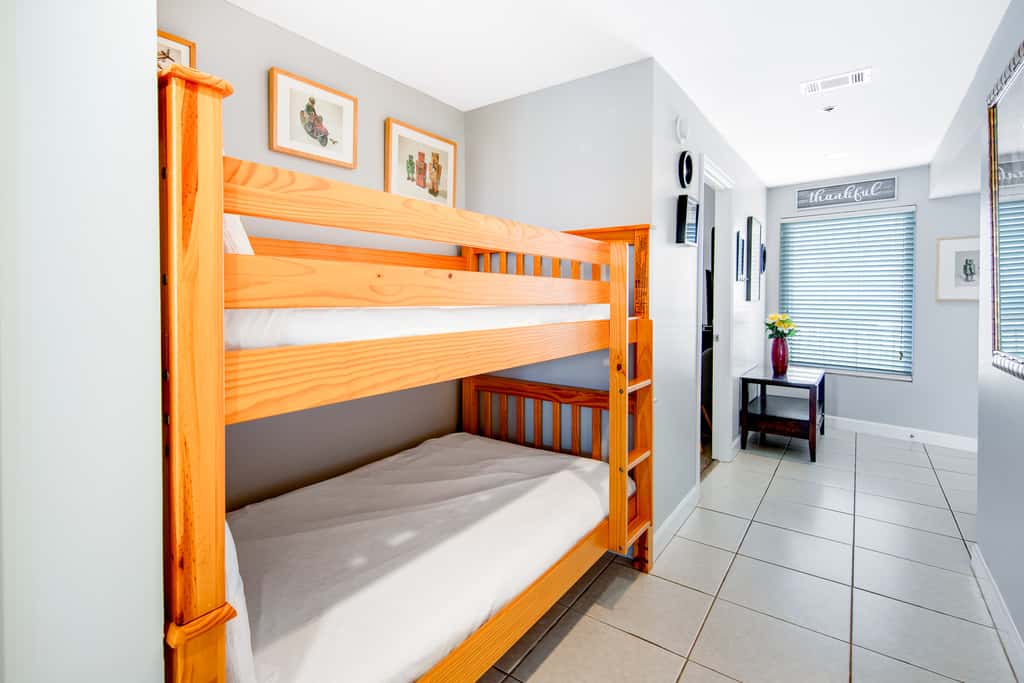 Colorful, beachfront condo with Gulf view, pool, hot tub, and lazy river