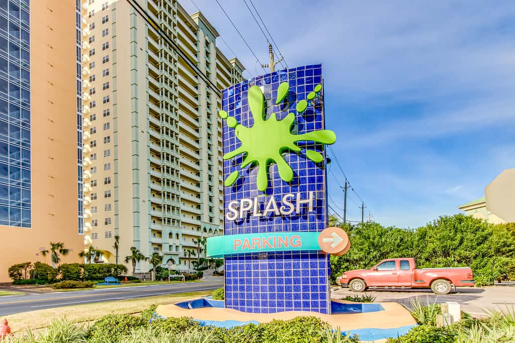 Colorful, beachfront condo with Gulf view, pool, hot tub, and lazy river