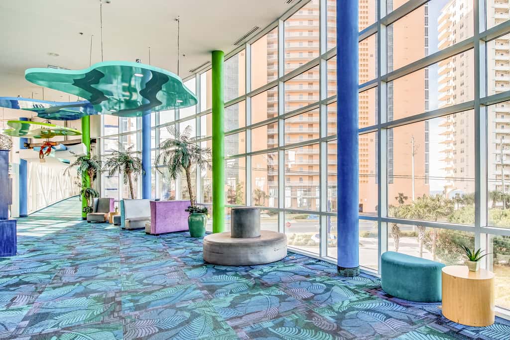 Colorful, beachfront condo with Gulf view, pool, hot tub, and lazy river
