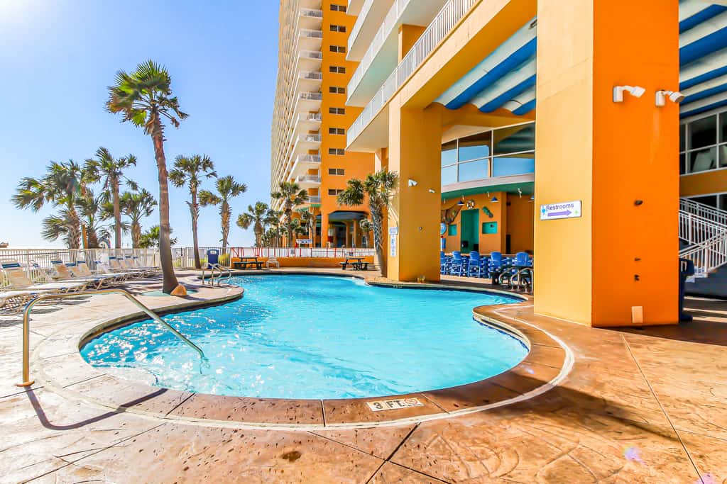 Colorful, beachfront condo with Gulf view, pool, hot tub, and lazy river