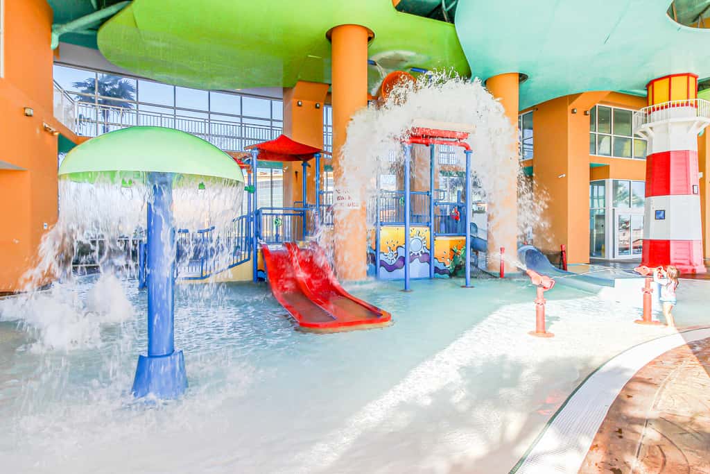 Colorful, beachfront condo with Gulf view, pool, hot tub, and lazy river