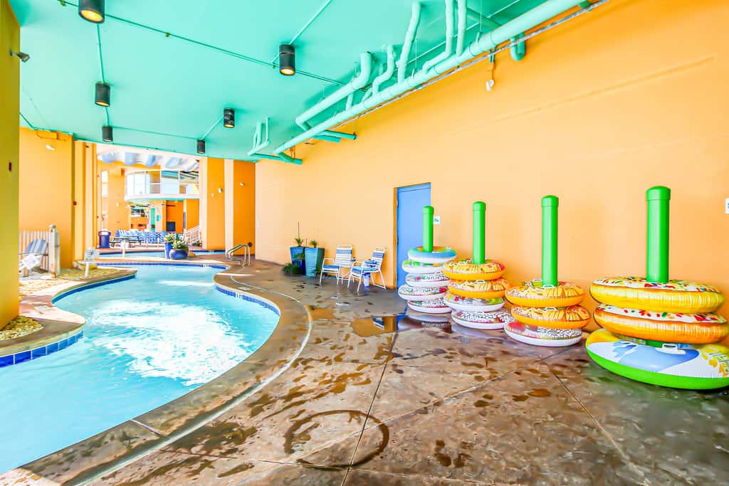 Colorful, beachfront condo with Gulf view, pool, hot tub, and lazy river