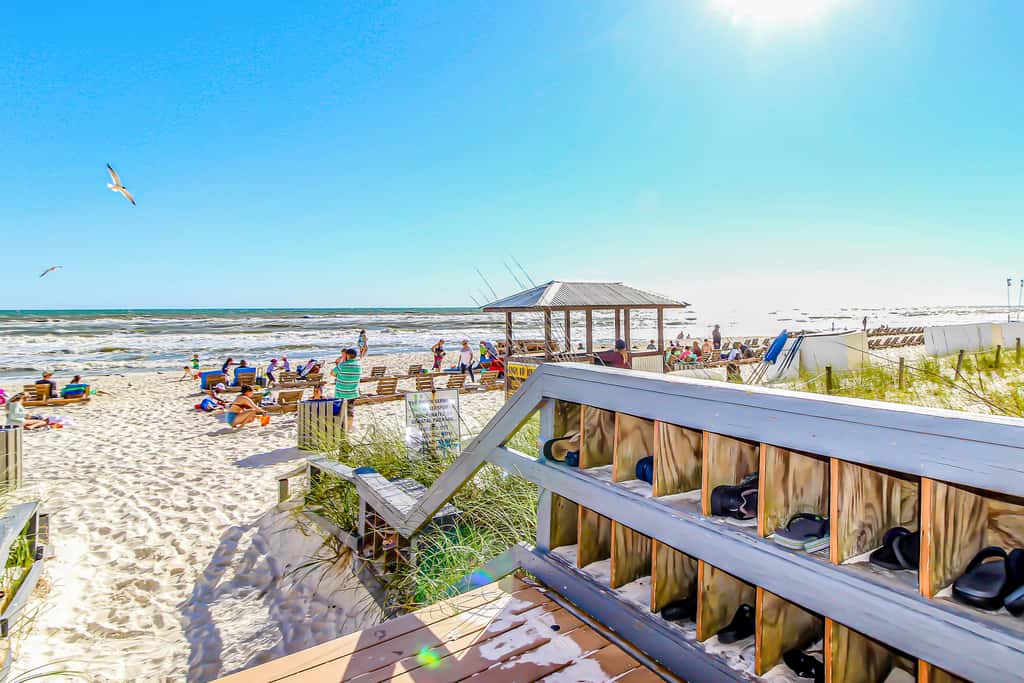 Colorful, beachfront condo with Gulf view, pool, hot tub, and lazy river