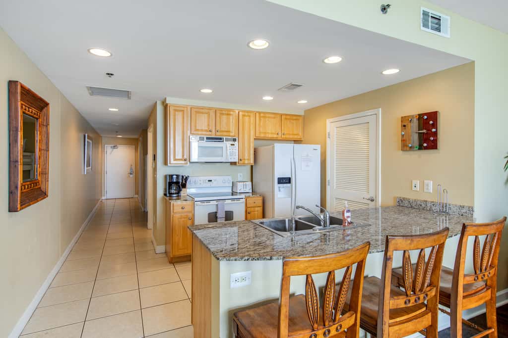 Stylish Gulf-front condo steps from the beach with resort pool, hot tub & gym