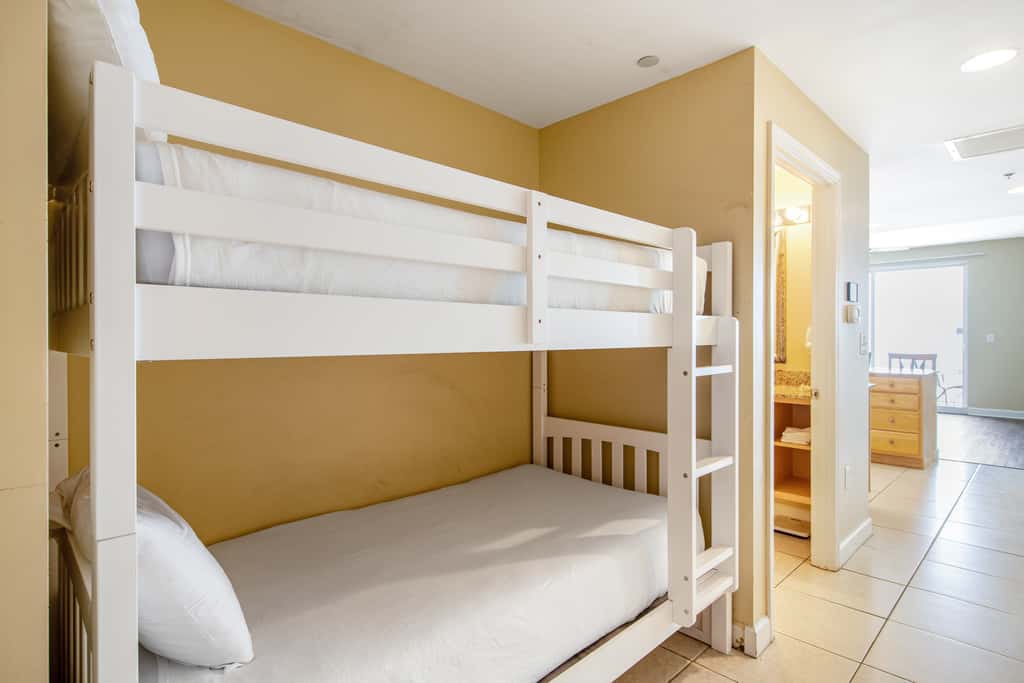 Stylish Gulf-front condo steps from the beach with resort pool, hot tub & gym