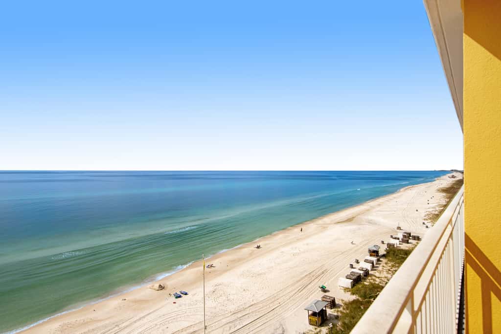 Stylish Gulf-front condo steps from the beach with resort pool, hot tub & gym