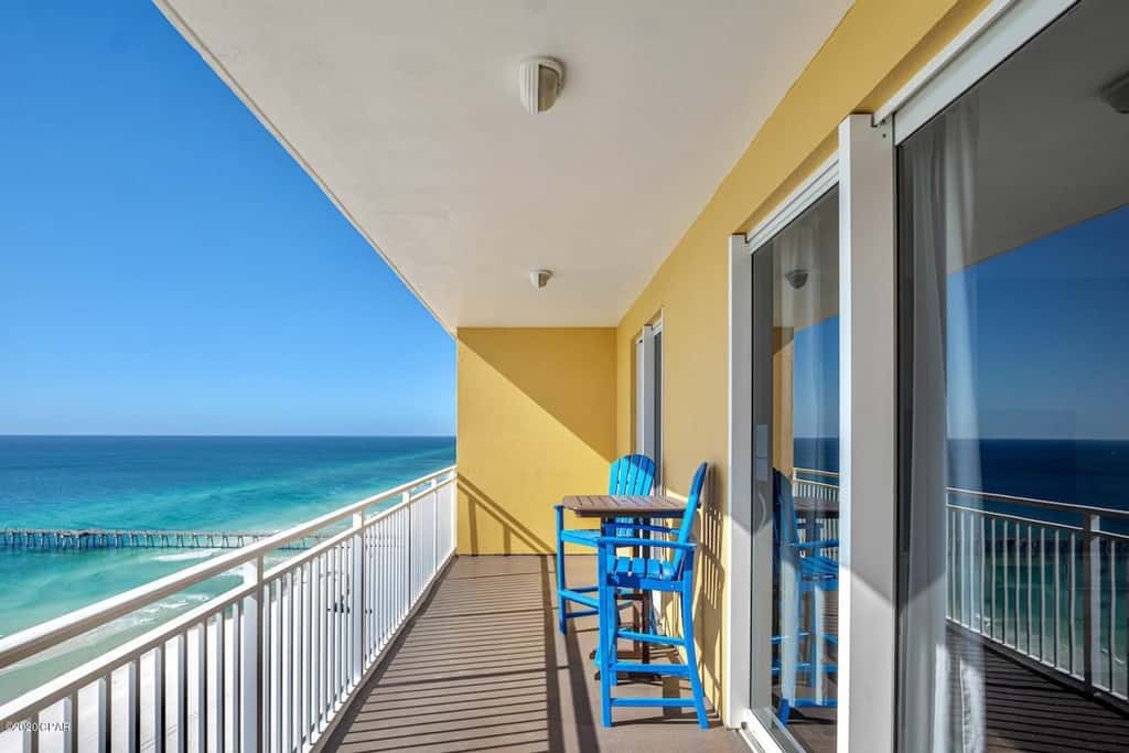 Gulf-front condo with pier views, balcony, heated pool, gym & AC