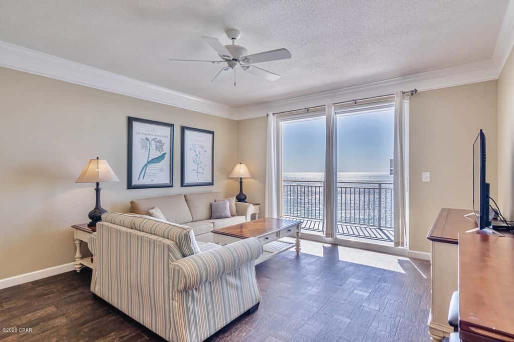 Gulf-front condo with pier views, balcony, heated pool, gym & AC