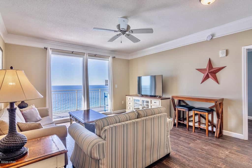 Gulf-front condo with pier views, balcony, heated pool, gym & AC