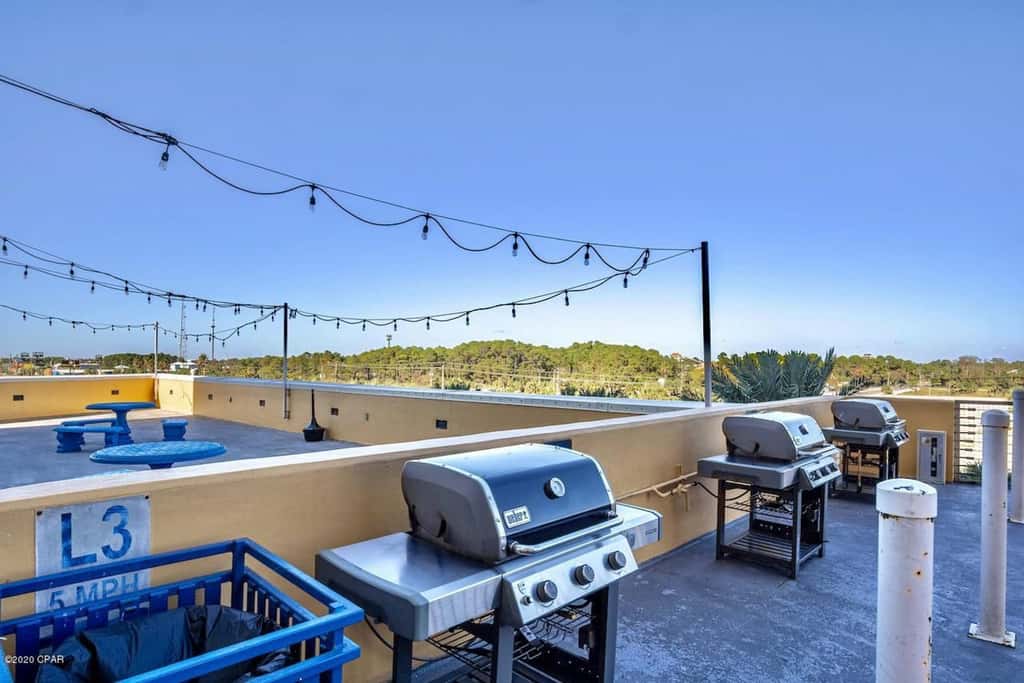 Gulf-front condo with pier views, balcony, heated pool, gym & AC