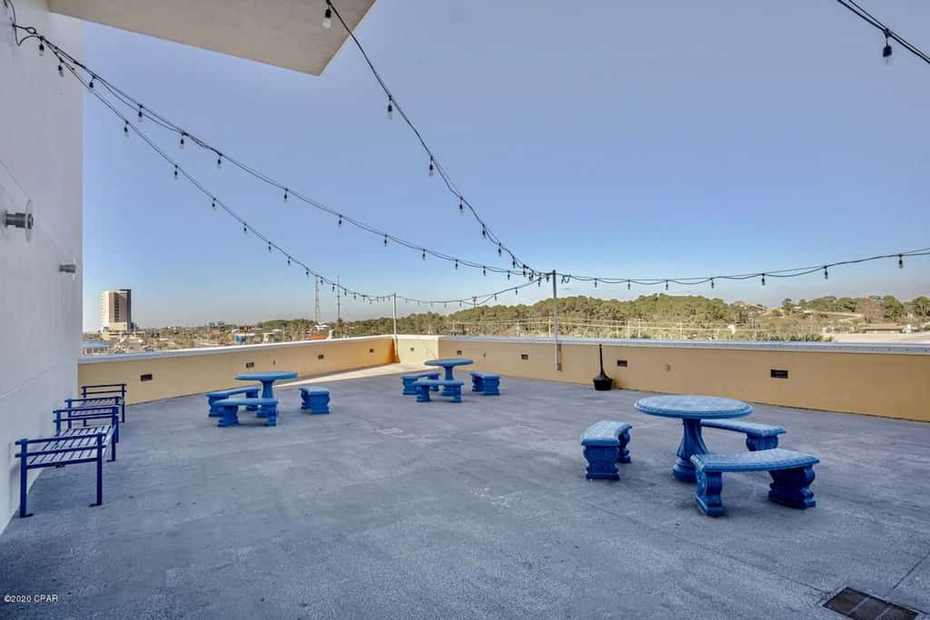 Gulf-front condo with pier views, balcony, heated pool, gym & AC