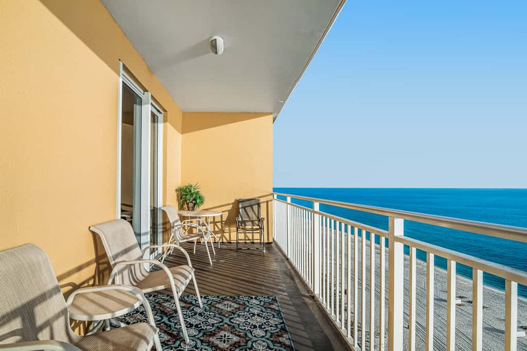 Snow-bird friendly condo with pool & fitness room - walk right out to the sand