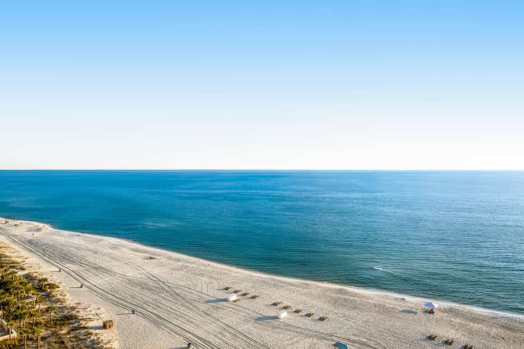 Snow-bird friendly condo with pool & fitness room - walk right out to the sand