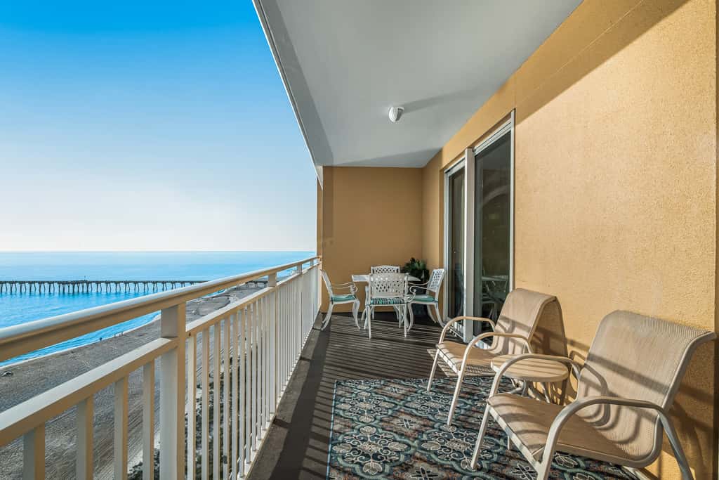 Snow-bird friendly condo with pool & fitness room - walk right out to the sand