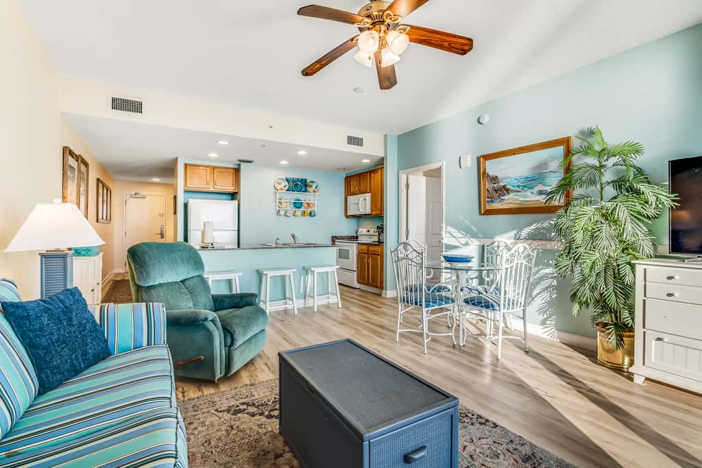 Snow-bird friendly condo with pool & fitness room - walk right out to the sand